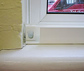 Window gate track cut-out facing window